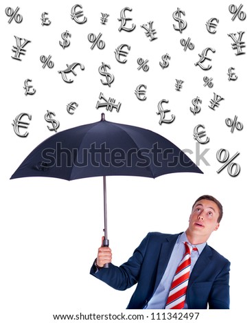 Young businessman looking up from under umbrella and expecting yield