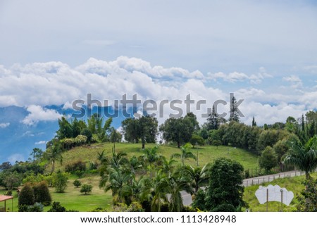 Landscape over the mountains and clouds in Jericó, Colombia Royalty-Free Stock Photo #1113428948