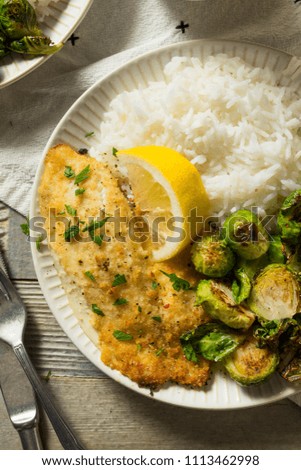 Homemade White Fish Filet Dinner with Rice and Brussel Sprouts