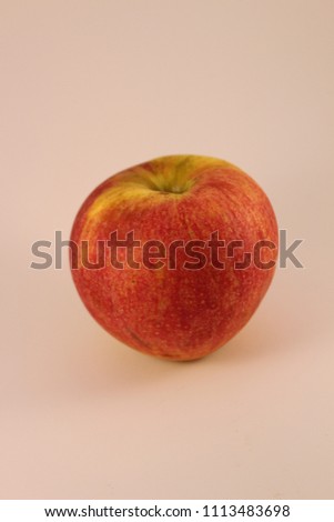 red and green apple isolated in lightbox