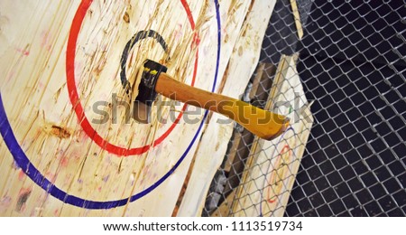 Indoor axe throwing hall for recreation, competition, leagues and team building. Royalty-Free Stock Photo #1113519734