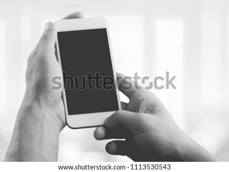 Phone in human hand