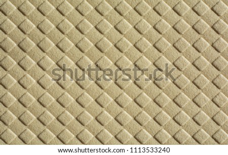 background of small beige rhombuses