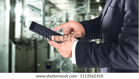 Engineer hand using tablet