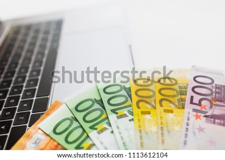 Euro on laptop's keyboard - make money online