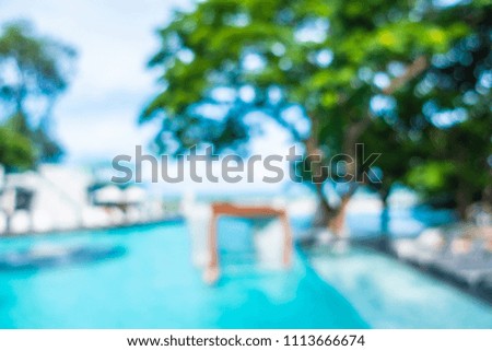 Abstract blur and defocused beautiful outdoor swimming pool in hotel and resort for background