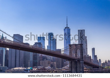 A sceneic view of Brooklin Brigde with Manhattan Skyline at background