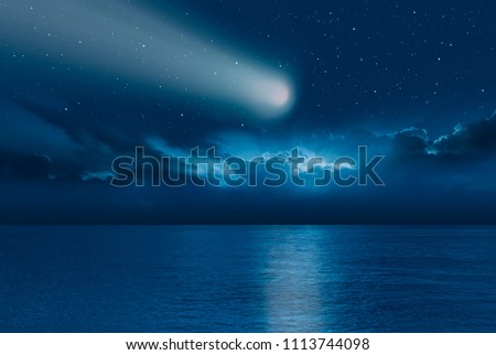Comet in the night sky"Elements of this image furnished by NASA "