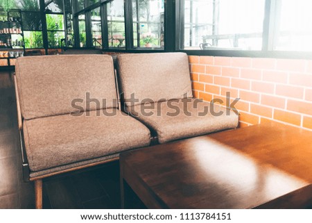 Cafe interior coffee shop with empty sofa.