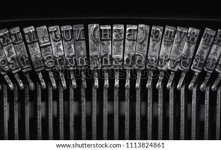 Close up of vintage, dirty typewriter letteters with copy space Royalty-Free Stock Photo #1113824861