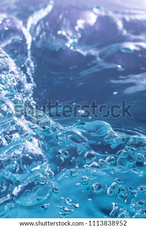 blue water wave with bubbles