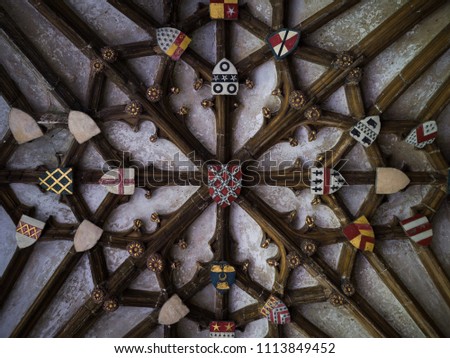 Symmetric heraldic sky in Canterbury Cathedral.