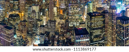 Panorama view of New York City Manhattan aerial skyline view with skyscrapers and building at night