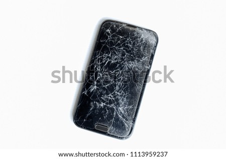 Top view of mobile phone broken isolated on white background.