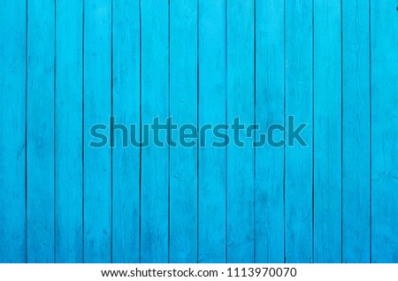 Old wooden wall painted blue planks, vertical pattern, background, texture 