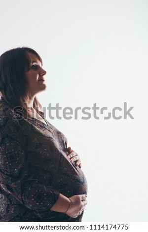 silhouette of Pregnant woman on a white background