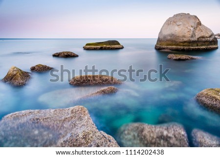 Long Exposure Seascape of the Rocks at Hin Wong Bay of Koh Tao, Thailand