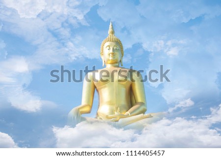 Large gold Buddha image in the sky and clouds.