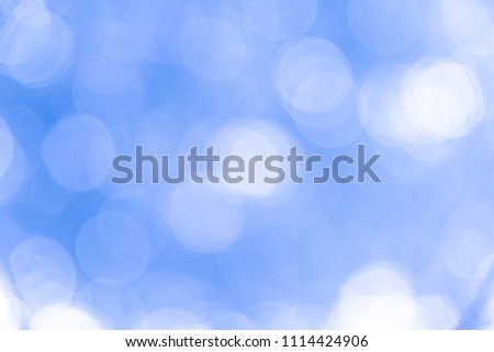 Abstract blurred blue bokeh background texture from natural