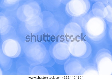 Abstract blurred blue bokeh background texture from natural