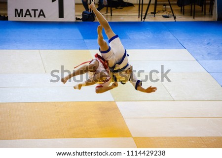 Fight of two athletes Asian Kuresh fight on the mat Royalty-Free Stock Photo #1114429238