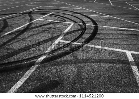 Full Frame Shot Of Burnout Marks On A Parking Lot