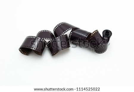 35mm photo film rolls. Isolated on white background.