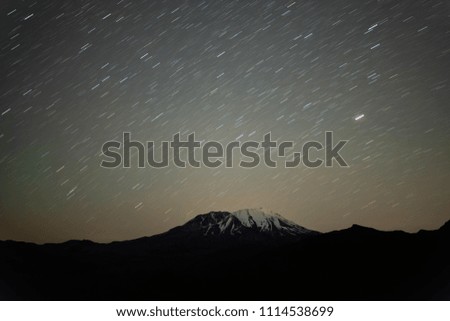 Star trail over Mount Saint helens volcano. Long exposure.