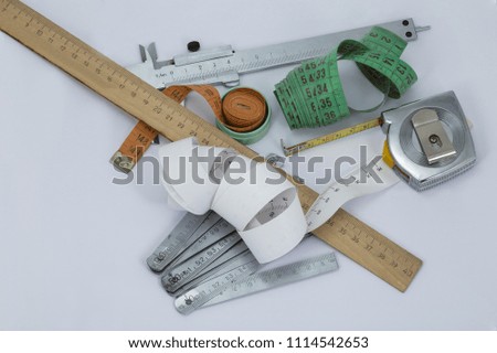 A set of measuring tools on a white background