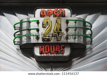 Retro Open 24 Hours neon illuminated sign