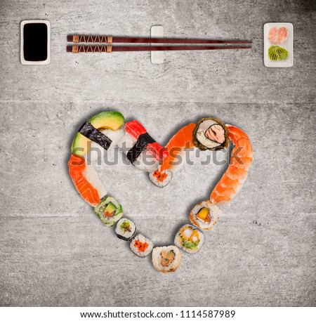 Traditional japanese sushi pieces making inscription and heart symbol. Very high resolution image.