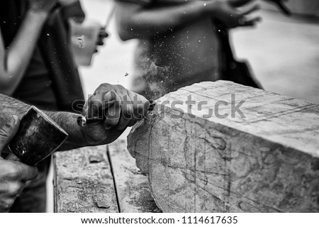 Carving stone, craftsman shaping stone, art and crafts Royalty-Free Stock Photo #1114617635