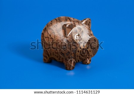 Piggy bank with Gears on blue background