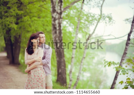 Couple walking in the park, love, feelings, relations. Copy space