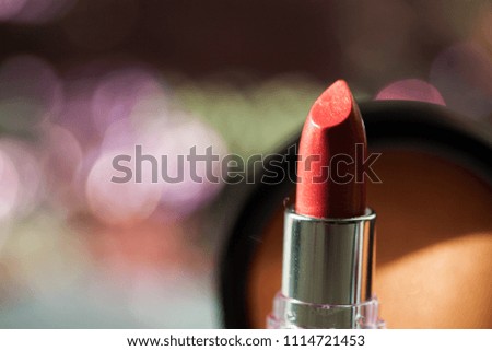 Red Lipstick. Open Silver Tube