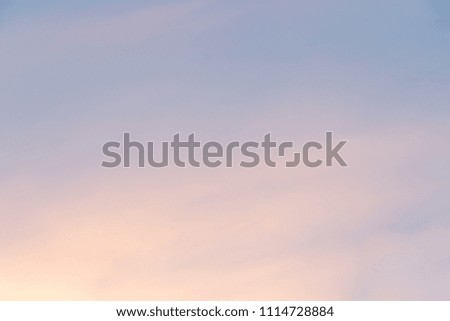 background,defocusing. gently pink clouds of the evening sky