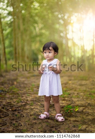 Asian malay girl play with cute smile face 