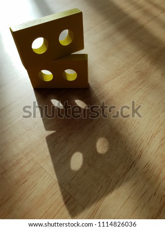 Colourful toy for kid learning on wooden background. Picture of a Classic Toy for Young Child.