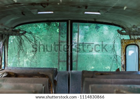 old vintage Military bus rear window and Old seat.