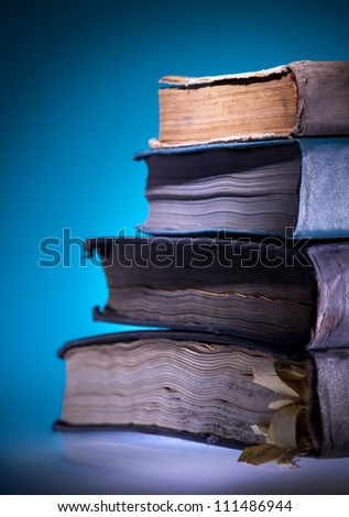Old books, blue light  background