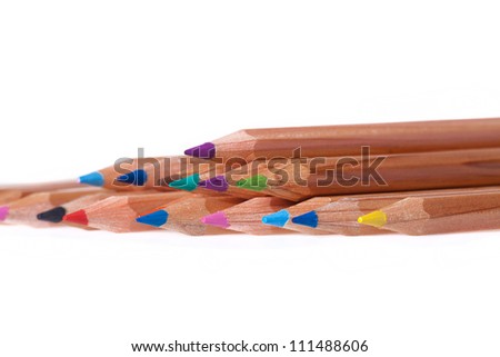Colorful pencils close up macro shot isolated on white background