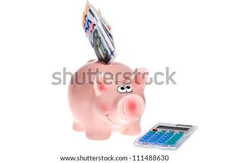 Smiling Pink piggy bank with Euro bank notes and a modern pocket calculator isolated on white background