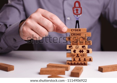 The concept of technology, the Internet and the network. Businessman shows a working model of business: Cyber crime