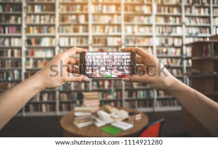 Close up woman arms making picture of volumes, cup of coffee and copybook on desk. She creating it by phone