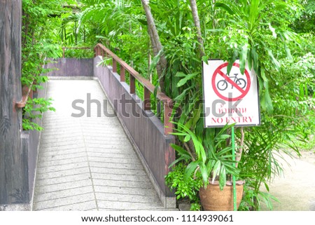 Bicycle stop sign. Bicycle ban No Bicycles walkway beside