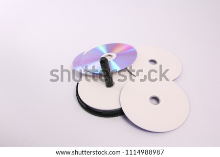 CD with white backdrop.