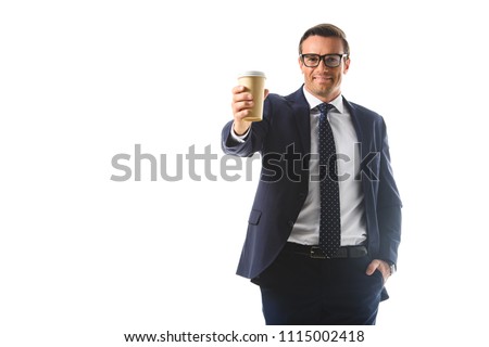 smiling businessman in eyeglasses holding paper cup of coffee isolated on white background 
