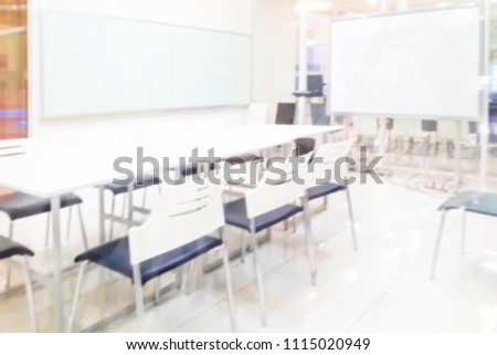 Blur image of inside the small meeting room , use for background.