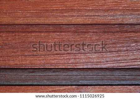 Brown scratched wooden cutting board. Wood texture, old wooden