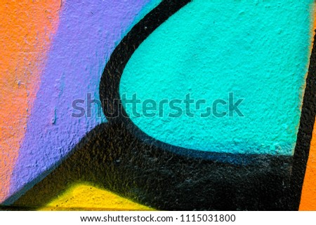 Colorful Graffiti texture on wall as background 
